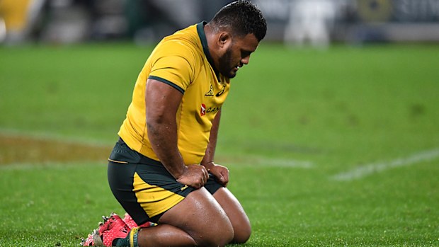 Taniela Tupou of the Wallabies prays after a match