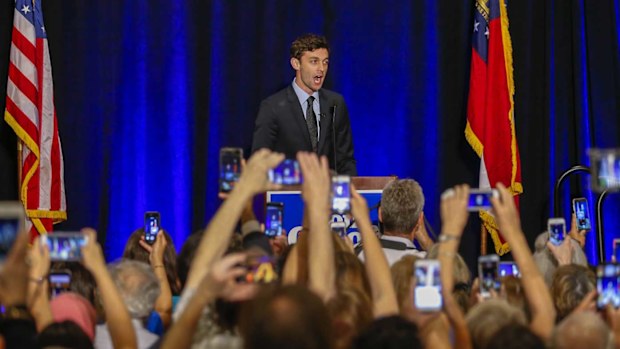 Jon Ossoff addresses the crowd following his big election win. (AAP)