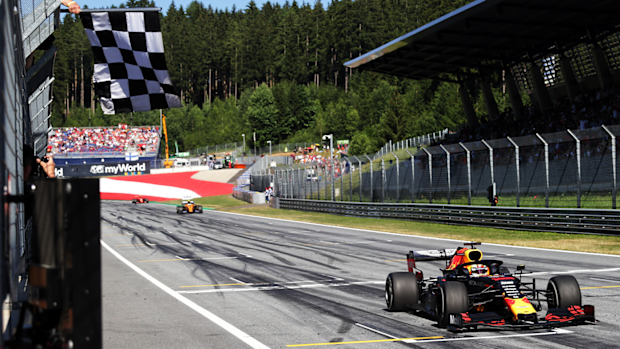 Max Verstappen takes the chequered flag in the Austrian GP.