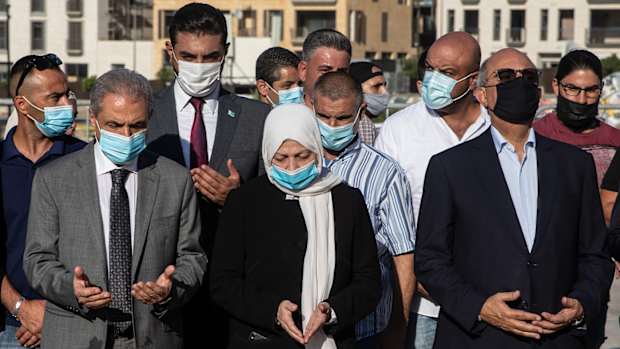 Bahiya al-Hariri, the sister of Lebanon's former Prime Minister Rafik al-Hariri, prays at his grave on August 18, 2020 in Beirut, Lebanon. 