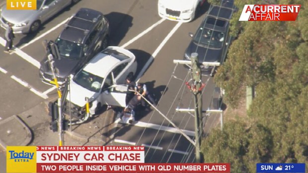 The chase ended when the car crashed into a traffic light pole near a school and shopping centre at North Rocks in the north-west.