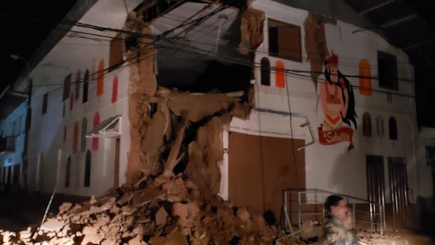Buildings collapsed and power was knocked out after the earthquake.