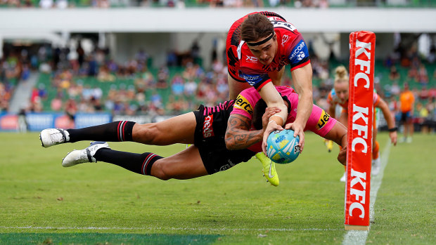 Cody Ramsey of the Dragons dives for the corner to score the game winning try