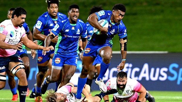  Vinaya Habosi of the Fijian Drua breaks away 