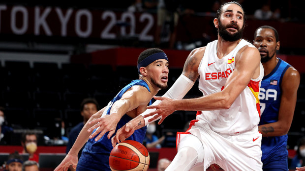  Devin Booker #15 of Team United States strips the ball away dfrom Ricky Rubio #9 of Team Spain during the second half of a Men's Basketball Quarterfinal game on day eleven of the Tokyo 2020 Olympic Games at Saitama Super Arena on August 03, 2021 in Saitama, Japan. (Photo by Kevin C. Cox/Getty Images)