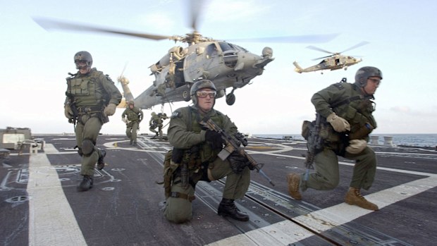 US Navy SEALs during a training exercise aboard the USS Oscar Austin. (AAP)