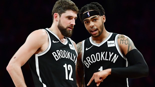Harris with Russell last season in Brooklyn