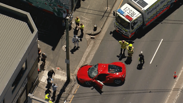 A Ferrari crashed into a power pole in St Peters Princes Highway