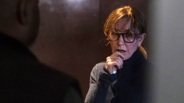Felicity Huffman looks tired and emotional in court 