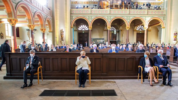 Stephan Harbarth, President of Federal Constitutional Court, German Chancellor Angela Merkel, German President Frank-Walter Steinmeier with his wife Elke Buendenbender during an Ecumenical church service to mark the 30th anniversary of German reunification on October 03, 2020 in Potsdam, Germany