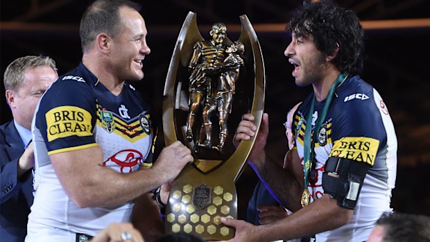 Matt Scott and Johnathan Thurston celebrate winning the NRL Premiership 