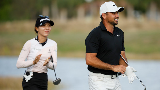 Lydia Ko of New Zealand and Jason Day of Australia walk up the 18th fairway during the final round of the Grant Thornton Invitational at Tiburon Golf Club on December 10, 2023 in Naples, Florida. (Photo by Cliff Hawkins/Getty Images)