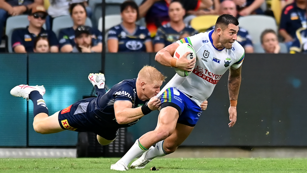 Nick Cotric is tackled during the round one NRL match between the North Queensland Cowboys and the Canberra Raiders.