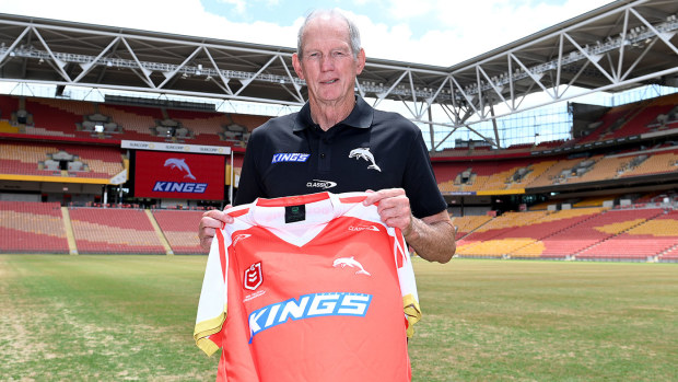 Wayne Bennett poses for a photo with the revealing of the Dolphins Heritage jersey