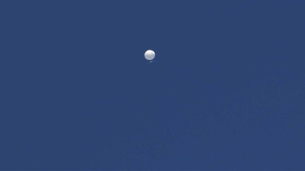The first Chinese spy balloon drifting over Columbia, Missouri.
