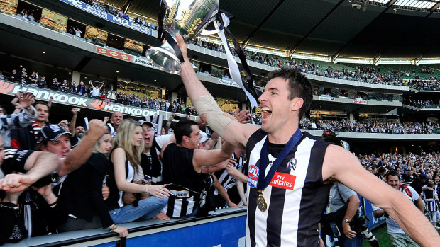 Darren Jolly with the AFL Premiership Cup