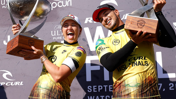 Carissa Moore of the United States and Gabriel Medina of Brazil celebrate after winning the the Rip Curl WSL Finals at Lower Trestles on September 14, 2021 in San Clemente, California. 