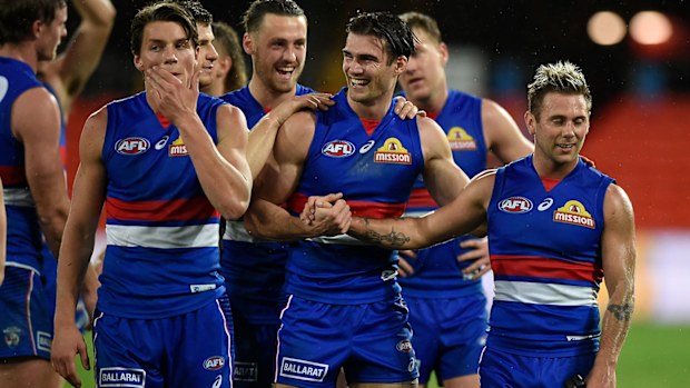 Western Bulldogs players celebrate