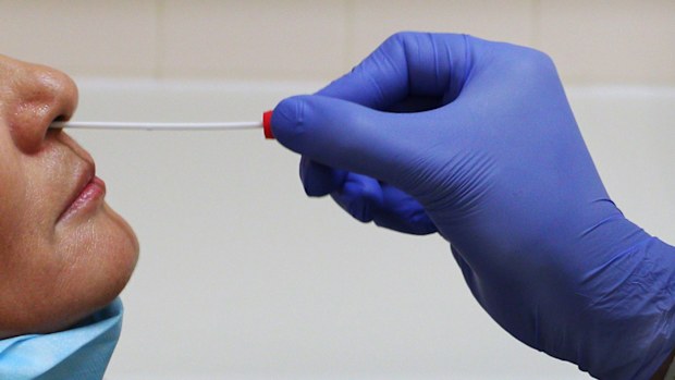 A coronavirus test being conducted at St George Hospital in Sydney.