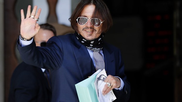 Actor Johnny Depp arrives at the High Court in London, Friday, July 17, 2020