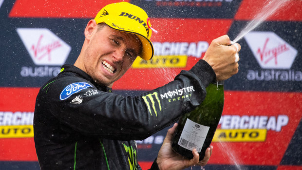 Cam Waters celebrates a 2nd place finish at the Bathurst 1000. 