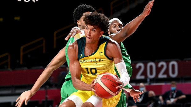 Matisse Thybulle of Australia drives to the basket during the preliminary rounds of the Men's Basketball match between Australia and Nigeria on day two of the Tokyo 2020 Olympic Games at Saitama Super Arena on July 25, 2021 in Saitama, Japan. (Photo by Bradley Kanaris/Getty Images)