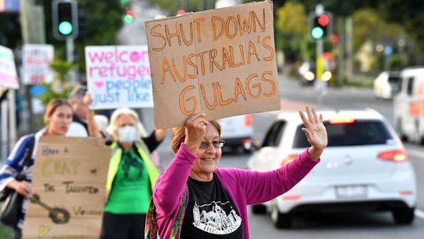 Protestors are seen outside the Kangaroo Point Central Hotel in Brisbane, Friday, June 12, 2020.