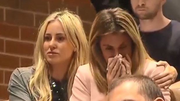 Roxy Jacenko comforts Candice Warner.
