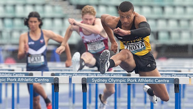Sasha Zhoya of Western Australia wins the U/18's 110 m men's final 