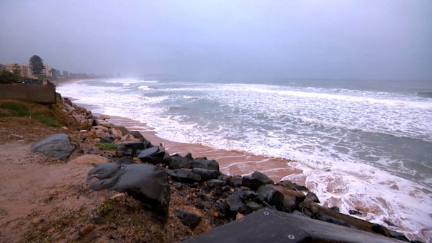 More than 6000 homes and businesses are without power on the NSW South Coast, after heavy rain, strong winds and large surf pounded coastal areas.