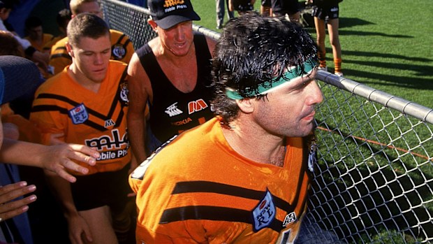 Ben Elias leads out the Balmain Tigers