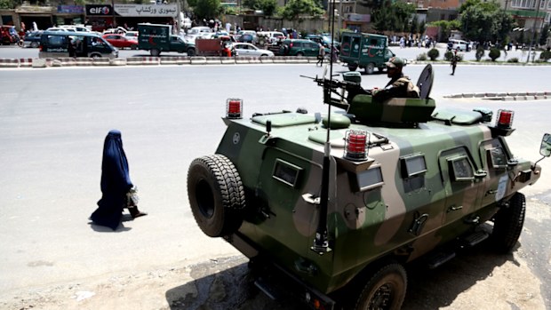 Security forces at the site of the suicide bombing in Kabul. (Photo: AP).