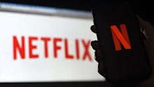 Netflix shed almost 1 million subscribers during the spring amid tougher competition and soaring inflation that's squeezing household budgets, heightening the urgency behind the video streaming service's effort to launch a cheaper option with commercial interruptions.
