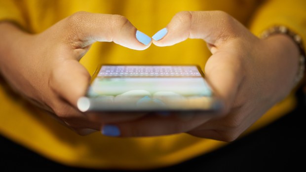Woman texting on phone