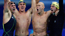 Ashley Callus, Chris Fydler, Michael Klim and Ian Thorpe after their win in the 4x100m freestyle relay.