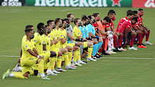 FC Dallas and Nashville kneel during the US national anthem at Toyota Stadium.