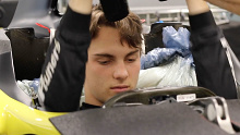 Oscar Piastri during his seat fitting at Renault's Enstone factory.