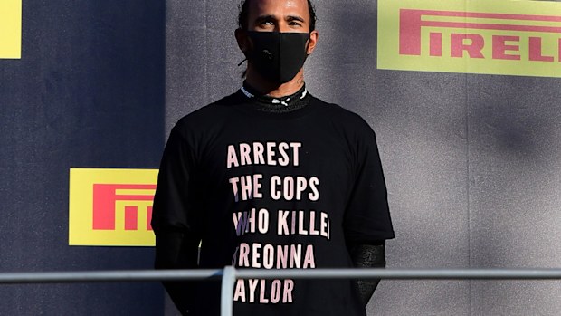 Lewis Hamilton on the podium after the Tuscan Grand Prix.