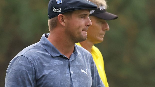 Bryson DeChambeau with Bernhard Langer during the final round of The Masters.
