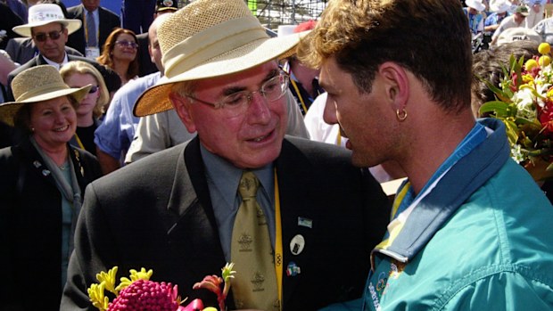 Michael Diamond with then-Prime Minister John Howard during the Sydney Olympics.