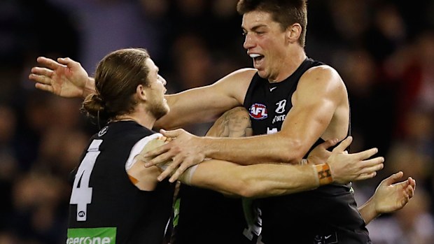 Matthew Kreuzer and Bryce Gibbs playing for Carlton in 2016.