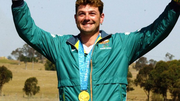 Michael Diamond on the dais with his gold medal at the Sydney Olympics.