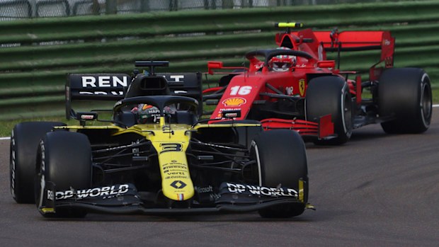 Charles Leclerc chases Daniel Ricciardo at Imola.