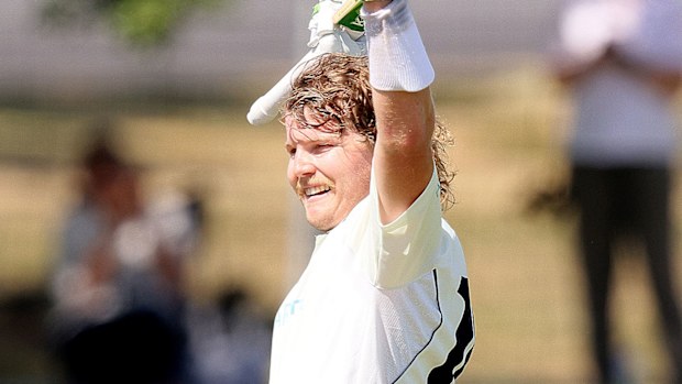 Will Pucovski celebrates after reaching his century against Western Australia.