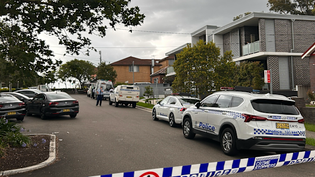 Police investigating after woman's body found at unit in Sydney's south west.
