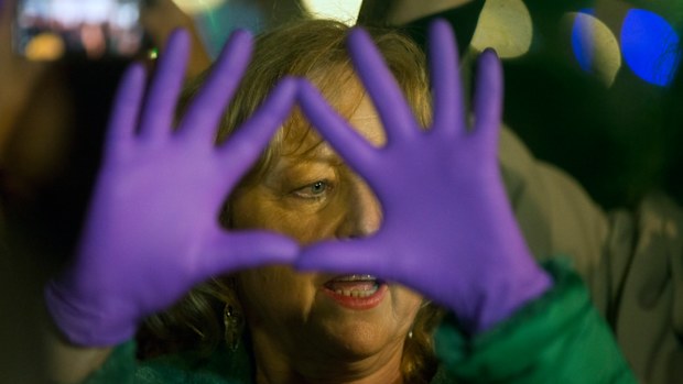 Many of the protesters wore purple, a color associated with feminist movements, a sign of solidarity and support.