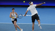 Germany's Laura Siegemund and Alexander Zverev during their United Cup doubles semifinal tennis match against Australia's Storm Hunter and Australia's Matthew Ebden in Sydney, Australia, Sunday, Jan. 7, 2024. (AP Photo/Mark Baker)