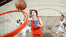 Josh Giddey drives to the hoop against the Brooklyn Nets. 