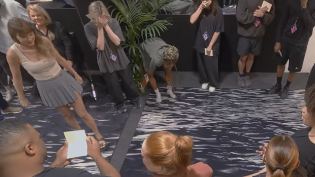 Taylor Swift's crew fell to their knees and broke down in tears after finding out they were getting a significant chunk of $US197 million ($295.5 million) in bonuses for their work on the Eras Tour. 