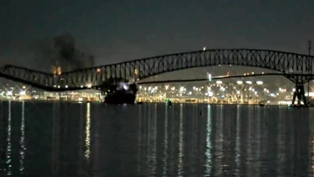 Parts of the Francis Scott Key Bridge remain after a container ship collided with a support Tuesday, March 26, 2024, in Baltimore.